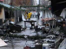 manhattan-holiday-market-fire-flames-spread-tems-charred