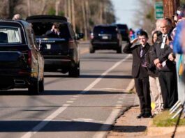 jimmy-carter-state-funeral-flag-draped-casket-en-route-to-atlanta